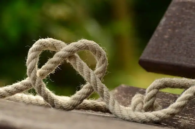 Tying a heart-shaped knot in a length of rope